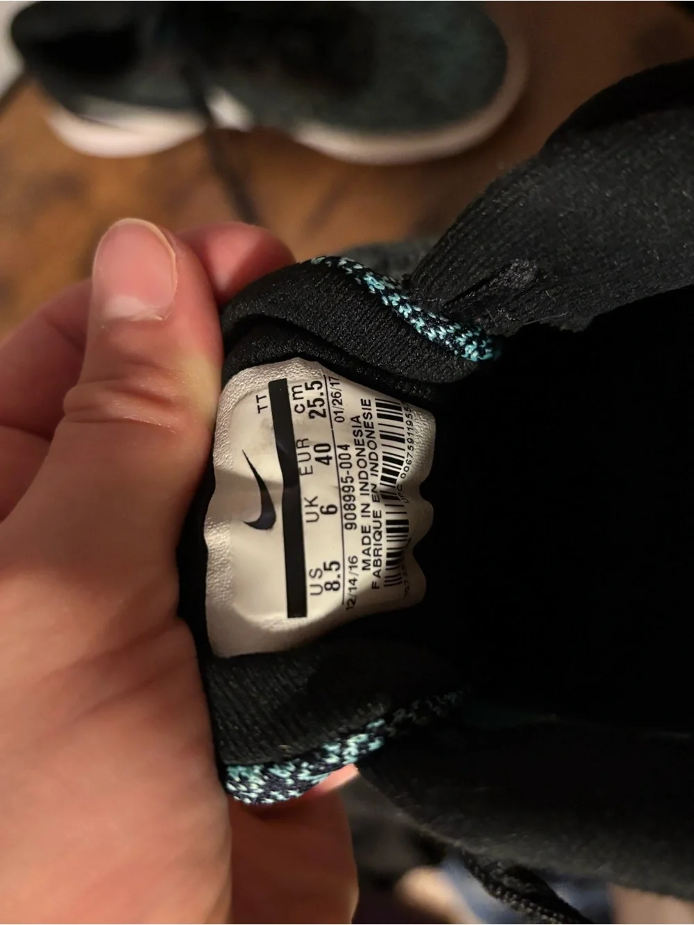 Nike Black Sneakers with Teal Accent
